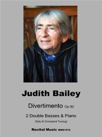 Photograph of composer Judith Bailey on a music book titled Divertimento Op. 92 2 Double Basses & Piano (Solo & Orchestral Tuning) Recital Music RMD1572. The background colour is grey.