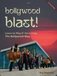 A book cover titled "bollywood blast!" with "Learn to Play Eb Horn/Tuba The Bollywood Way" and "Kay Charlton" at the bottom. The image features a group of musicians playing instruments, including a dhol drum and brass instruments, in front of a modern building with a red sky in the background. "C629" is in the top center, and "Eb Horn/Tuba" is diagonally in the top right corner.